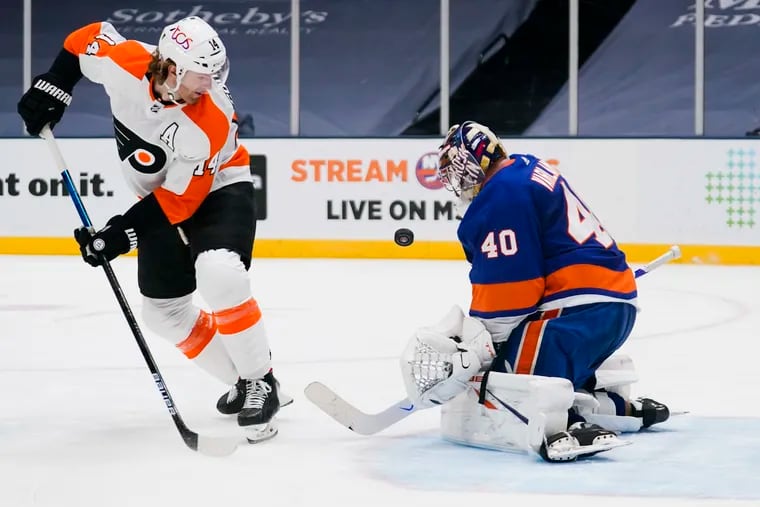 Islanders goaltender Semyon Varlamov stops a shot by Flyers center Sean Couturier in the first period.