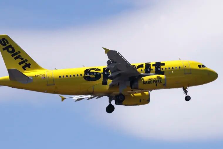A Spirit Airlines Airbus 319 airliner approaching Logan Airport in Boston.