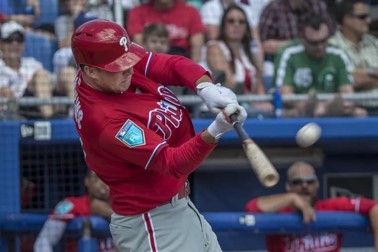 Rhys Hoskins hits his second homer of the game in the 7th inning to give the Phillies a 3-2 lead over the Toronto Blue Jays on Wednesday.