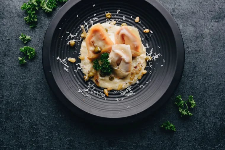 Sweet potato and buffalo chicken ravioli, as photographed for the upcoming Whisk cookbook.