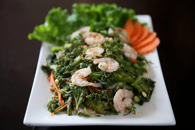 The sadao salad of bitter flower leaves with cabbage, cucumber and shrimp at I Heart Cambodia in South Philadelphia.
