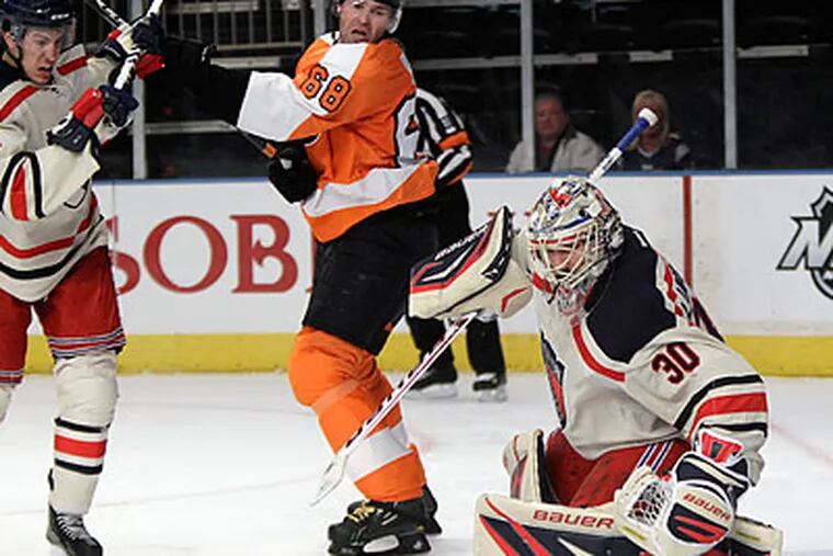The Flyers now are as close to seventh-place Ottawa in the East as they are to first place. (Kathy Willens/AP)
