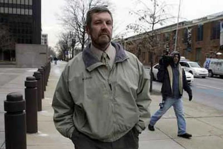 Joseph Forte is seen after exiting the breezeway between the federal building and federal courthouse in Philadelphia, Tuesday, Jan. 27, 2009. According to prosecutors, Forte ran a Ponzi and fraud scheme that swindled $59 million from about 80 investors between 1995 and 2008. (AP Photo/Matt Rourke)
