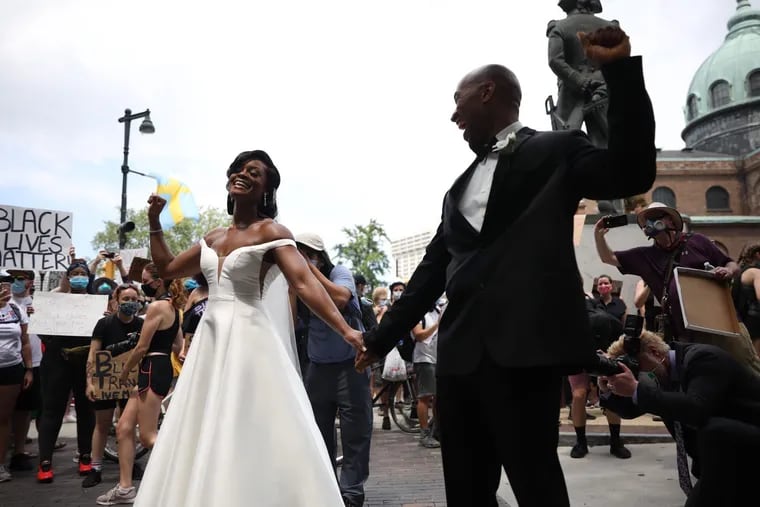 Kerry Anne and Michael Gordon came out to the crowd of protesters to show their support for the protest against the death of George Floyd and Black Lives Matter on their wedding day along 16th Street and Benjamin Parkway on Saturday June 6, 2020