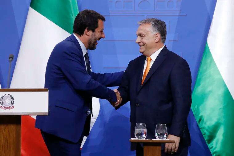 Italian Deputy Prime Minister and Minister of Interior Matteo Salvini, left, and Hungarian Prime Minister Viktor Orban shake hands during a joint press conference in the prime minister's office in Budapest, Hungary, Thursday, May 2, 2019.