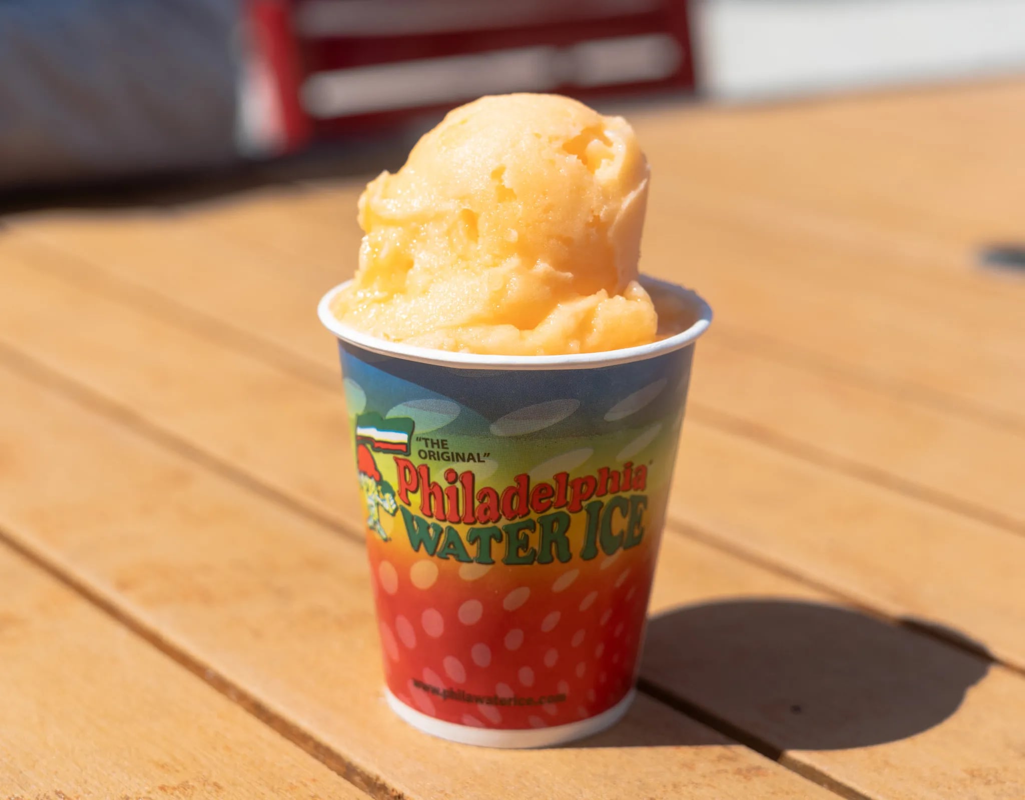 A cup of mango water ice from Philadelphia Water Ice concession stand at Citizens Bank Park.