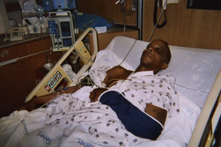 Kyle Byrd lies in hospital bed after March altercation involving several police officers.