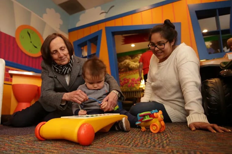 Ann ‘Teddy’ Thomas (left), the executive director of the Ronald McDonald House of Southern New Jersey, with cancer patient Mateo Bonacquisti and his mother, Ilse.