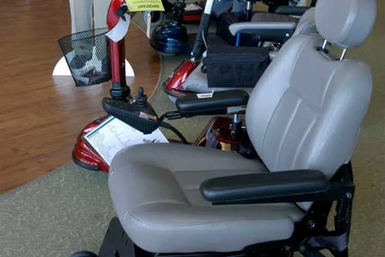 Motorized chairs at a Scooter Store in Houston. Search warrants were served at its headquarters outside San Antonio and other sites.