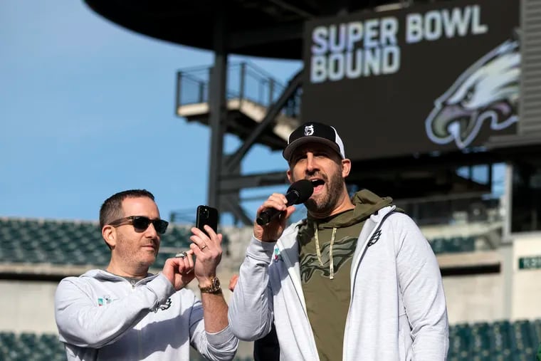 Eagles head coach Nick Sirianni (right) greets the crowd alongside general manager Howie Roseman during a Super Bowl send-off party at Lincoln Financial Field Sunday, Feb. 5, 2023 in Philadelphia, Pa.