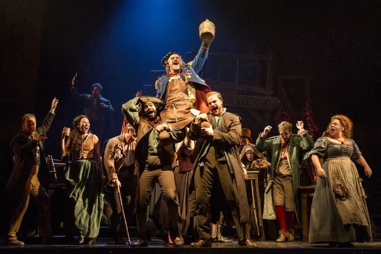 The cast of the national tour of “Les Miserables” sing “Master of the House.” The musical is at the Academy of Music through Jan. 21.