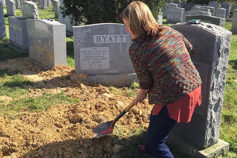 The columnist at Mrs. Hyatt’s grave at Har Zion Cemetery.