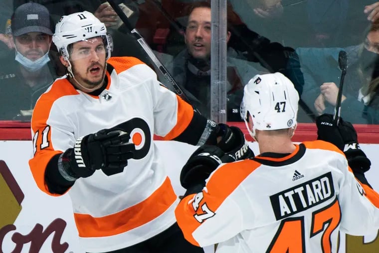 The Flyers’ Travis Konecny celebrates with teammate Ronnie Attard after scoring against the Canadiens on Thursday.