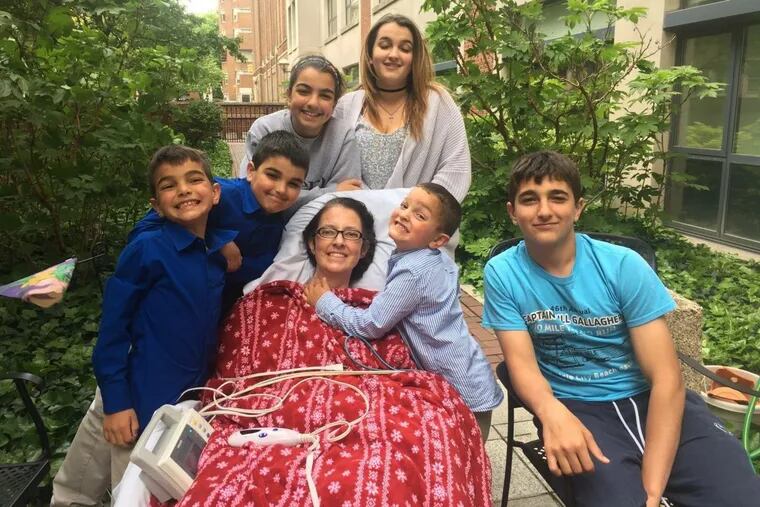 Dr. Amy Reed and her six children gathered close as they celebrated their last Mother’s Day this year. She died about a week later of a cancer that was worsened by power morcellation.