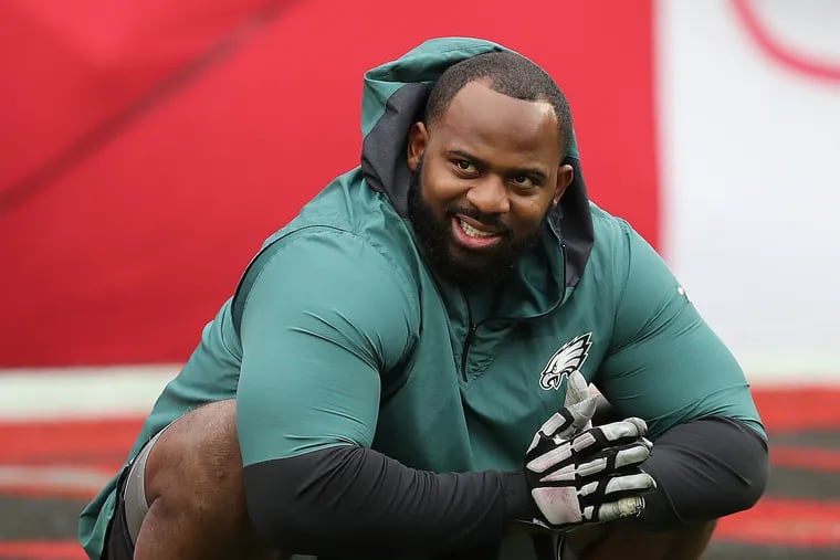 Philadelphia Eagles defensive tackle Fletcher Cox warms up before the Eagles play the Buccaneers at Raymond James Stadium in Tampa, Fla.  on Sunday, Jan. 16, 2022.