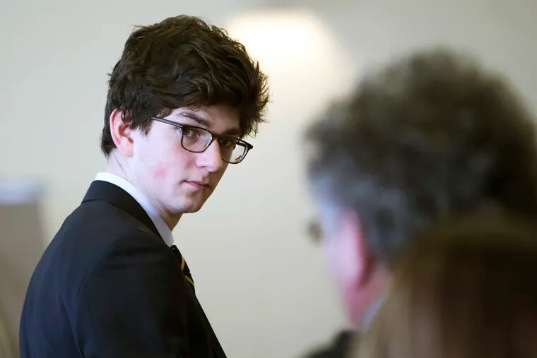 FILE - In this Feb. 21, 2017, file photo, Owen Labrie looks at his family during a break on the first day of a hearing in Concord, N.H., on whether he deserves a new trial. Labrie, a New Hampshire prep school graduate convicted of sexually assaulting a 15-year-old classmate, was released from jail, Monday, June 24, 2019, for good behavior. (Geoff Forester / Concord Monitor via AP, Pool, File)