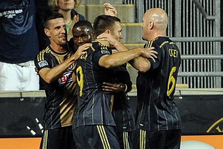 Philadelphia Union forward Sebastien Le Toux (11) celebrates his goal with teammates during the first half of the match against the San Jose Earthquakes at PPL Park. (John Geliebter/USA Today)