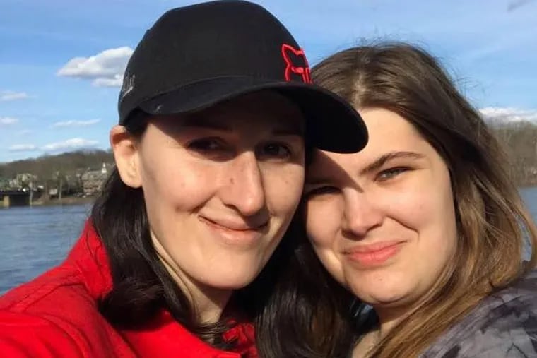 Laura Bluestein (left) is charged in the killing of her wife, Felicia Dormans, in their Mount Holly, N.J. home. They are pictured here in a June 2017 Facebook post, two months before Dormans was shot in the face.