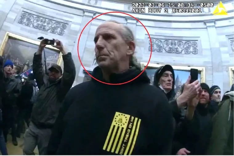 Surveillance footage from the U.S. Capitol building showing James Robinson, of Schwenksville, among the crowd that mobbed the Rotunda during the Jan. 6, 2021 attack on the building.