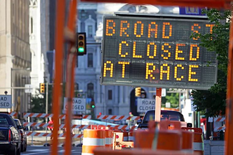 Broad Street is now closed at Race St. to City Hall. (David Swanson / Inquirer)