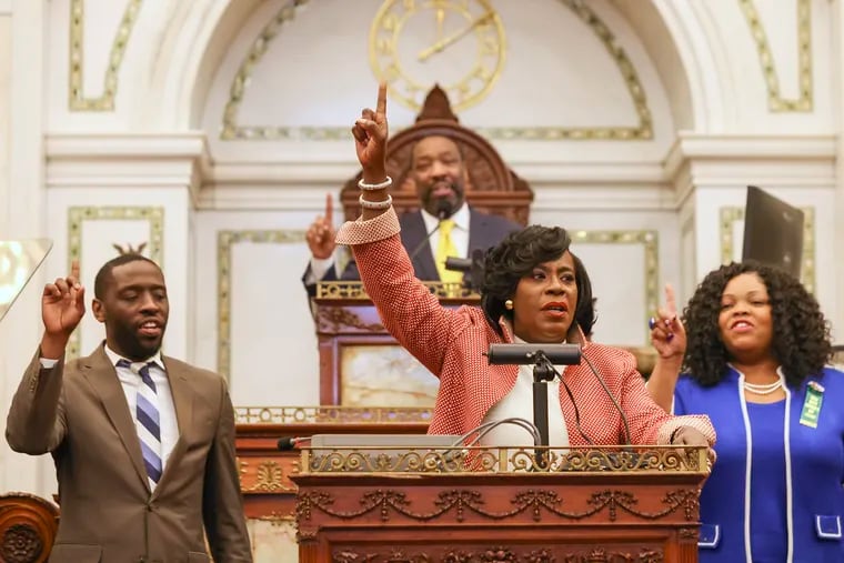 Philadelphia Mayor Cherelle L. Parker does her “One Philly” sign while concluding first budget address in City Council chambers in Philadelphia, Pa. on Thursday, March 14, 2024.
