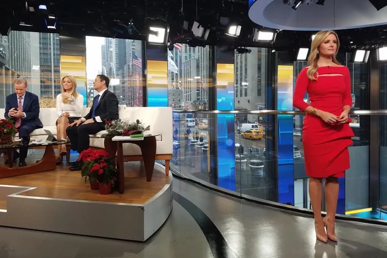 Fox & Friends news anchor Jillian Mele (right) waits for her segment to begin as hosts Steve Doocy, Ainsley Earhardt, and Brian Kilmead chat during a commercial. Mele is leaving Fox News after four years.