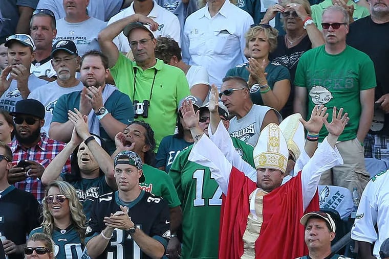 Through one Eagles fan dressed like the pope during the Dallas game, the behavior of other fans was less than saintly.