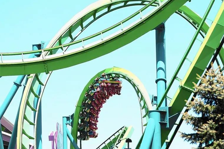 A roller coaster at Dorney Park & Wildwater Kingdom in Allentown, Pa. The amusement park's parent company, Cedar Fair, is merging with Six Flags.