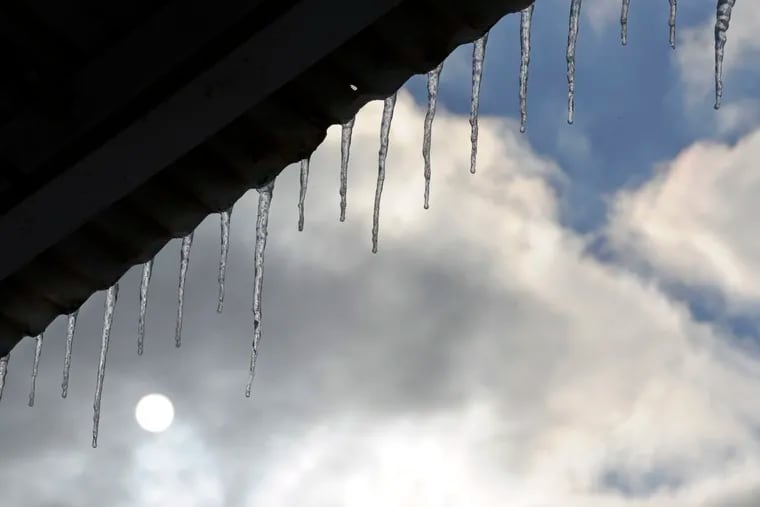 Icicles are formed on a shelter along the Camden Waterfront in February 2015. Icy conditions are possible on roads Sunday morning.