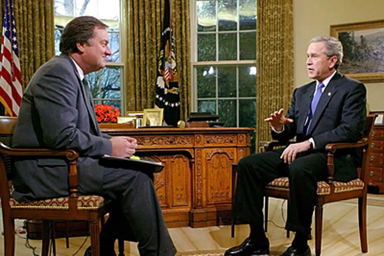 President Bush being interviewed in 2004 by Tim Russert on NBC's "Meet the Press."  (AP)