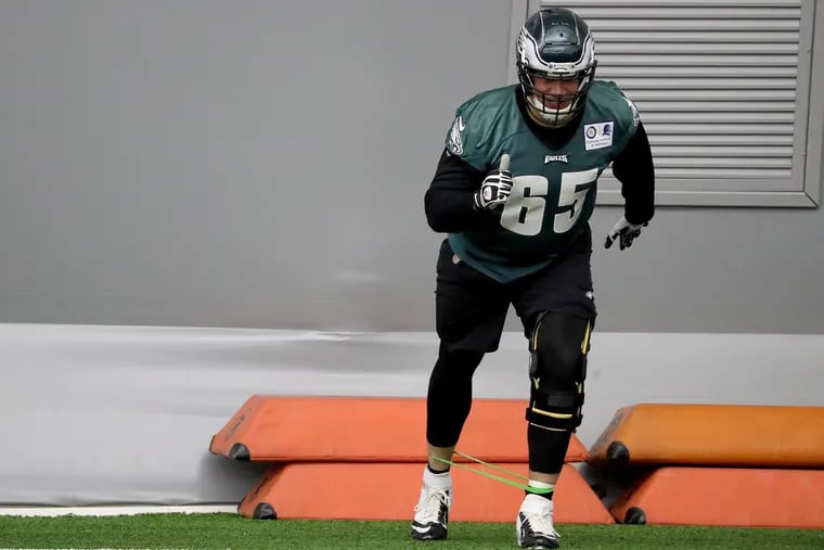 Eagles Lane Johnson stretches during Eagles practice at the NovaCare Complex in Philadelphia, PA on November 14, 2018. The Eagles face the Saints on November 18. DAVID MAIALETTI / Staff Photographer