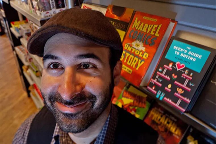 Eric Smith, author of "The Geek's Guide to Dating," at Brave New World comics. (David M Warren/Staff Photographer)