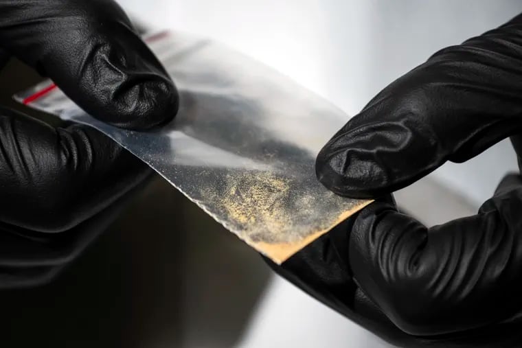 A sample of nitazene powder, a drug more potent than fentanyl, is examined at the Center for Forensic Science Research, a toxicology lab in Montgomery County, where a person recently died of an overdose involving a nitazene analogue.