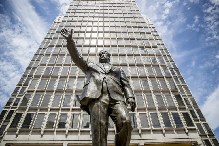 The statue of former mayor Frank Rizzo stands in the Thomas Paine Plaza in front of the Municipal Services Building, across from City Hall. There is now a movement to have the statue removed to a different location.
