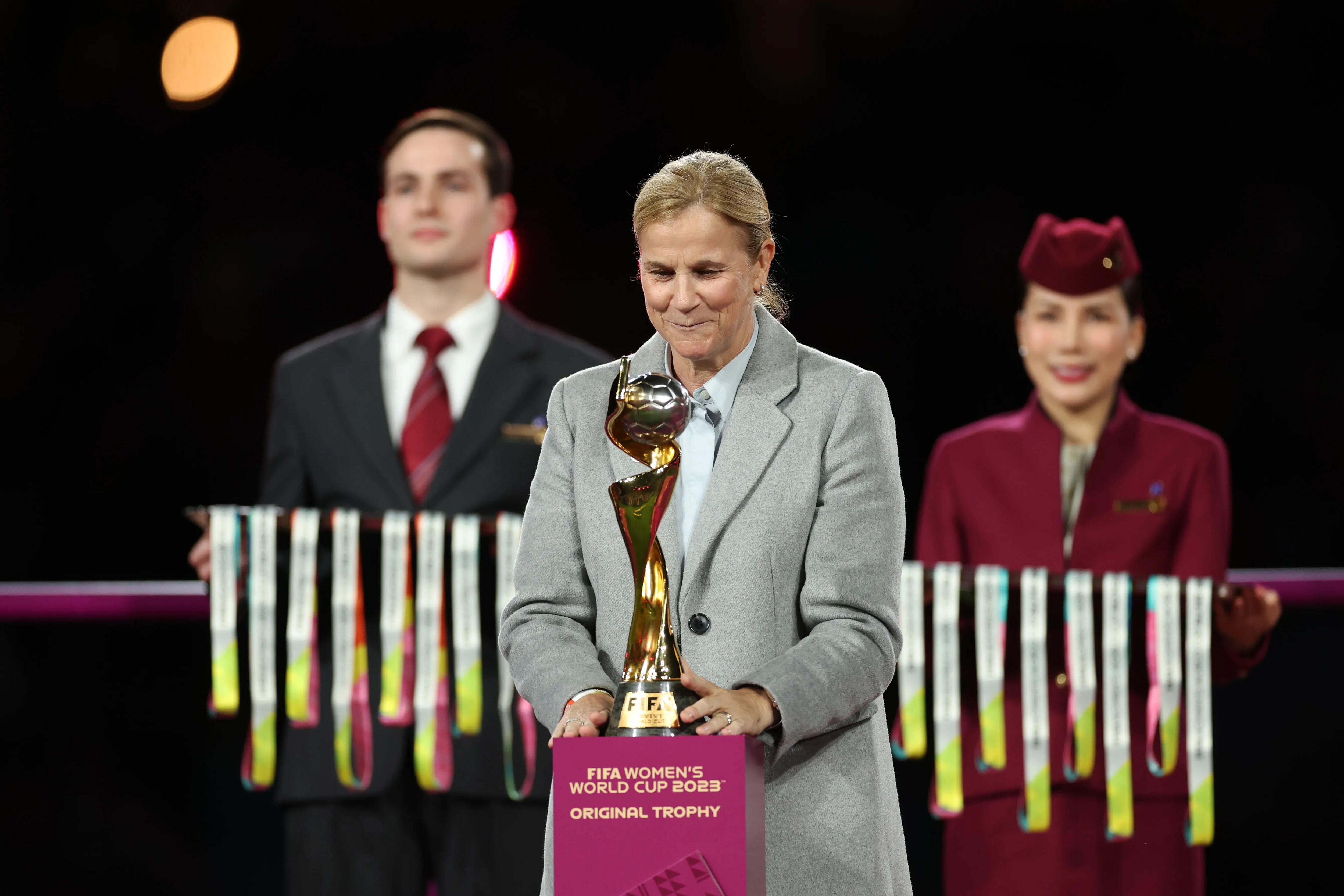 Jill Ellis presented the women's World Cup trophy on stage after the final.