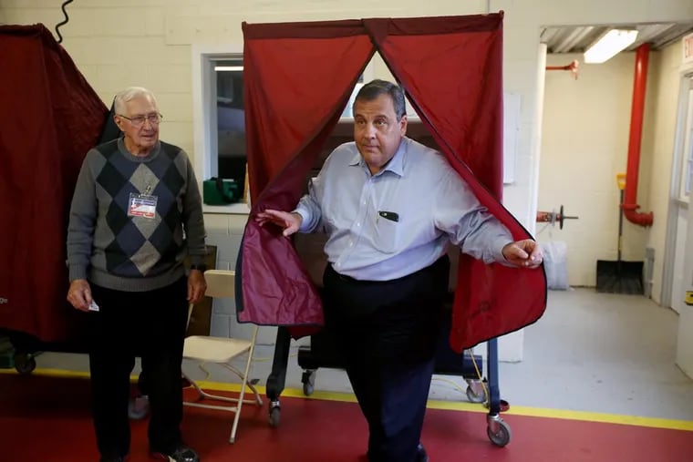 Gov. Christie walks out of the voting booth after casting his ballot Tuesday in Mendham, N.J.