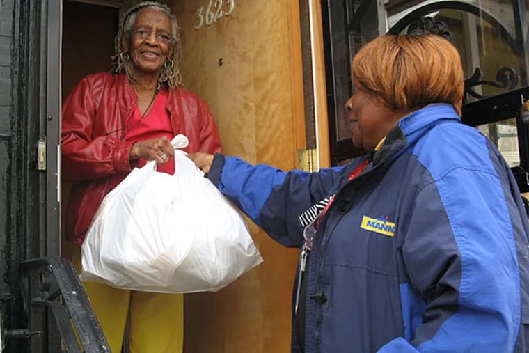 A MANNA worker making a meal delivery in Philadelphia.