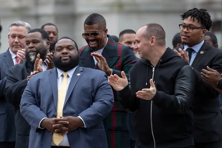 State Rep. Jordan Harris is applauded during a press conference on legislation aimed at reforming the Pennsylvania probation and parole system at Thomas Paine Plaza Tuesday, April 2, 2019. The press conference included Meek Mill along with author and CNN host Van Jones, advocates and members of the REFORM Alliance, and state representatives and legislatures.