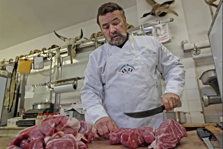 Sonny D'Angelo, seen here cutting sausage back in 2013. When D'Angelo hangs up his apron at the end of the month after a half-century of work, D'Angelo's Specialty Meats is due to close