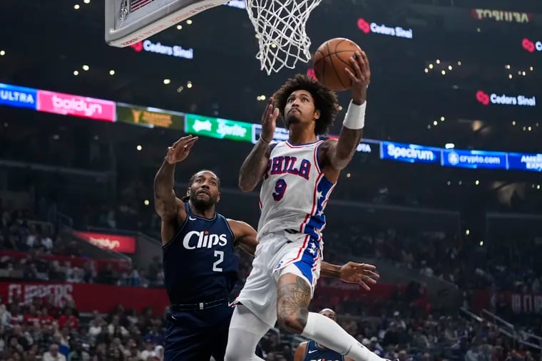 Sixers guard Kelly Oubre Jr. goes up for a basket past Clippers forward Kawhi Leonard during the first half in Los Angeles.