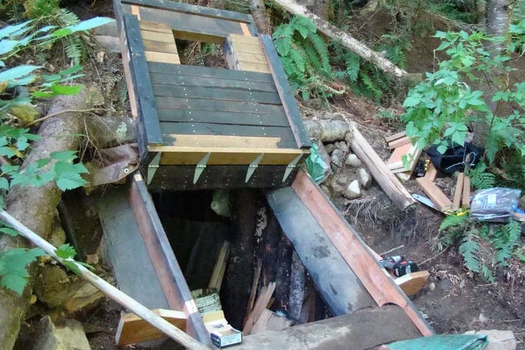 A man believed to be Peter Keller, wanted in the killings of his wife and daughter, made his last stand in a forest bunker east of Seattle.