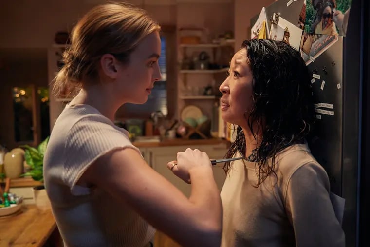 Jodie Comer (left) as Villanelle and Sandra Oh as Eve Polastri in a scene from BBC America's "Killing Eve."