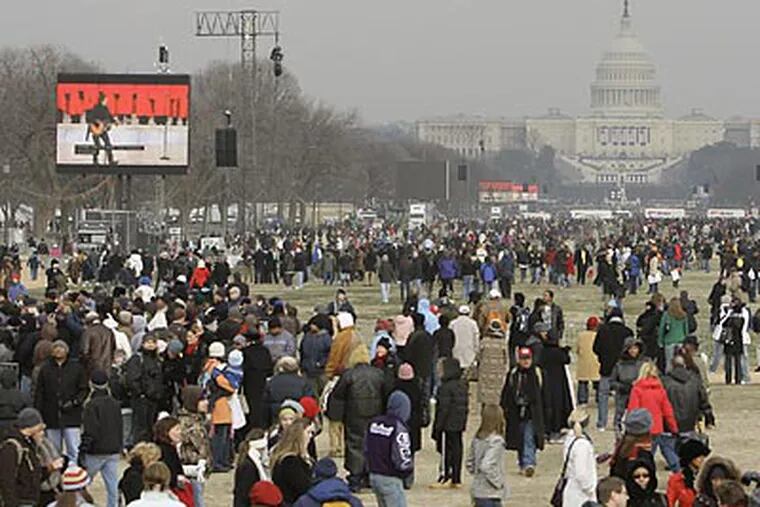 The nation's capital is already filling up with visitors ahead of tomorrow's inauguration. (Alex Brandon/AP)