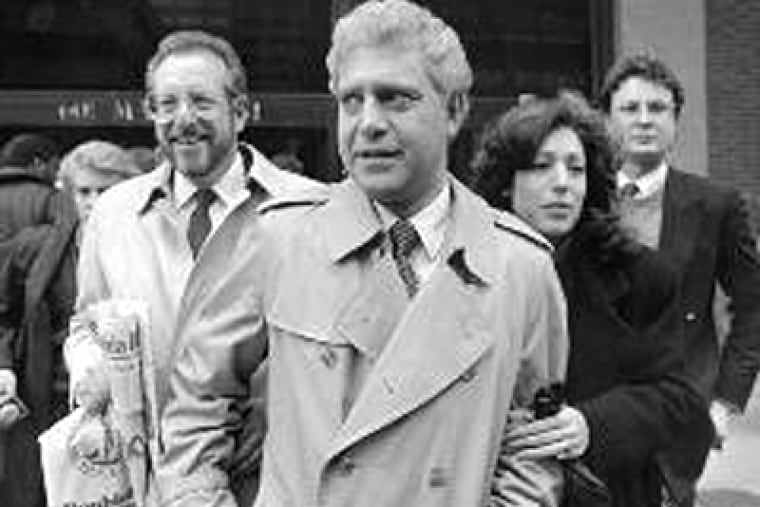 Leland Beloff (center) was a powerful city councilman when he was nailed for trying to shake down developer Willard Rouse. Here, he leaves the Federal Courthouse in 1987, accompanied by wife, Diann.