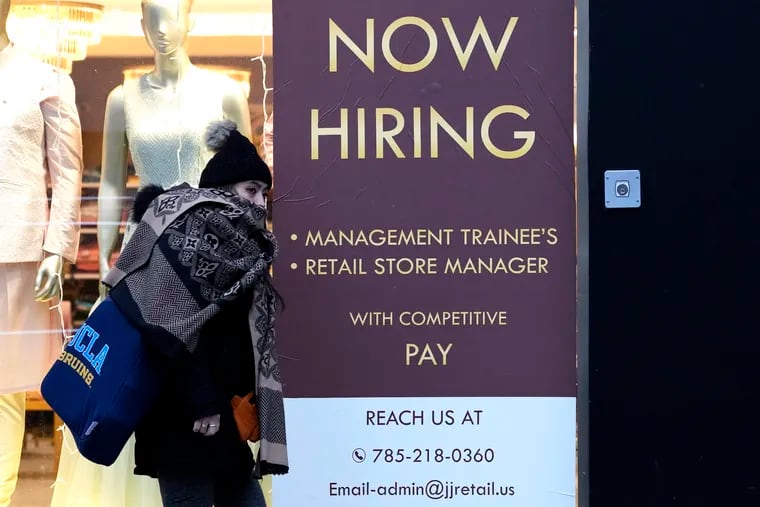 File - A hiring sign is displayed at a retail store in Chicago, Thursday, Jan. 5, 2023. On Thursday, the Labor Department reports on the number of people who applied for unemployment benefits last week.