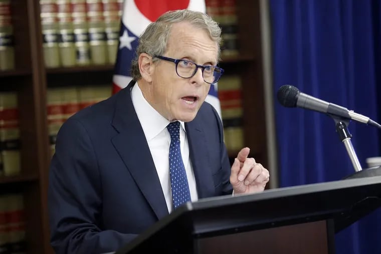 Ohio Attorney General Mike DeWine speaks during a press conference at the Attorney General’s office in Columbus, Ohio.