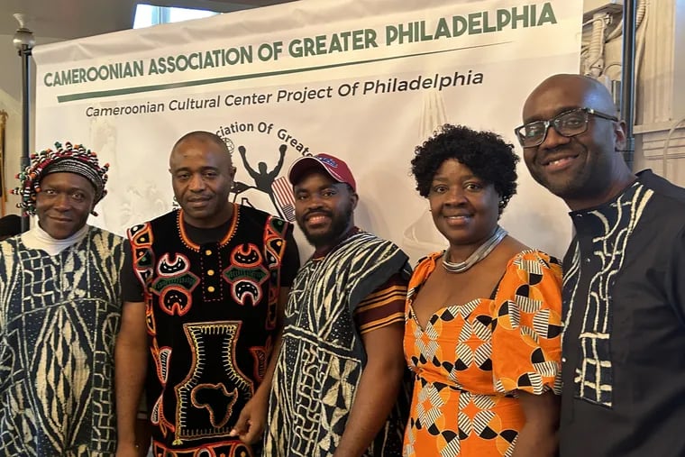 Members of the Cameroonian Association of Greater Philadelphia gathered Saturday, April 1, at Emmanuel Resurrection Episcopal Church for an African food-tasting event to promote plans for a new Cameroonian Cultural Center. From left are Kamgaing Camille, Aime Tchapda, Franck Kengne, Judith Godi, and Eric Ekobeni.