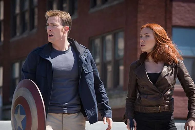 Chris Evans, left, and Scarlett Johansson in "Captain America: The Winter Soldier." (Courtesy Marvel Studios/MCT)