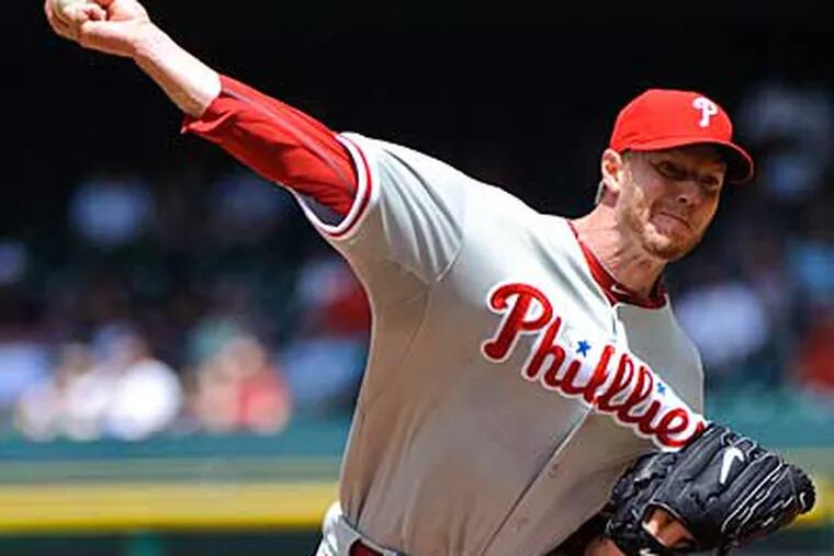 Roy Halladay went the distance against the Astros, allowing only one run. (AP Photo/Dave Einsel)