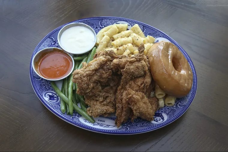 The fried chicken and doughnut platter is one of the better options at Founding Farmers.